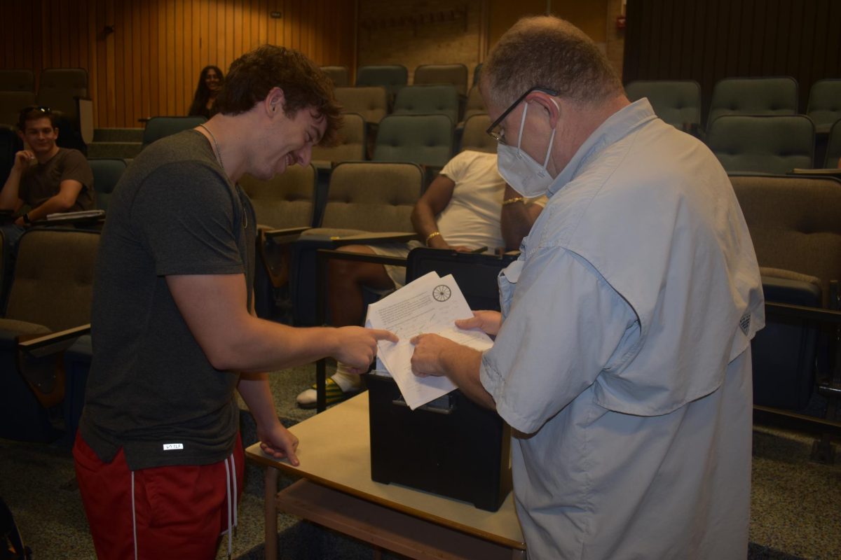 Most professors are always willing to work with students who need help navigating their new environment. Shown, physics professor John Miller.