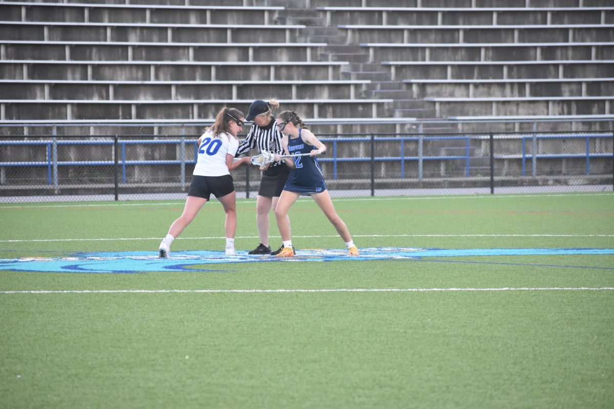 Savanna Reitz, left, a former Riverhawks lacrosse midfielder, plays against Harford Community College in spring 2023.