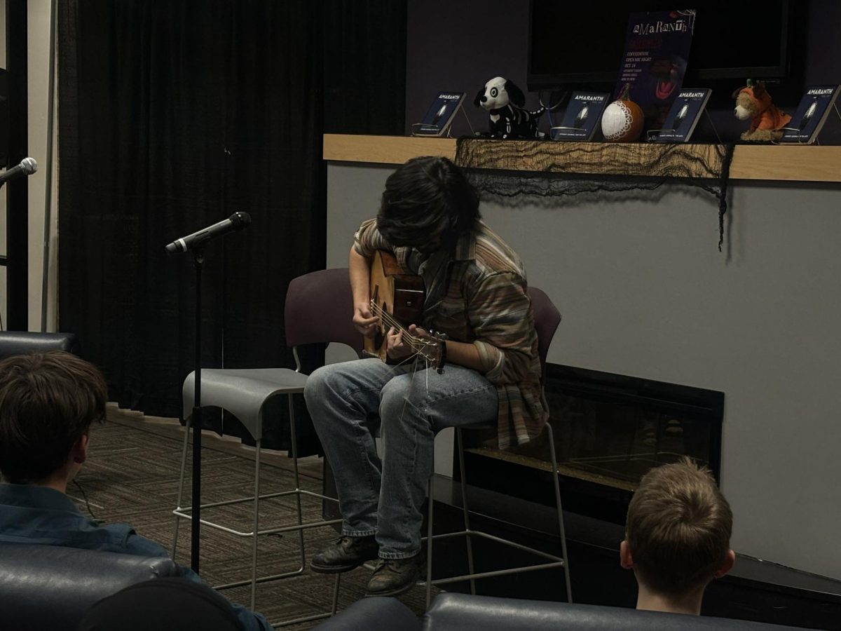 Students shared creative work at the second Amaranth Open Mic Night on Thursday. Shown, third-year film student Jason Kalshoven. 