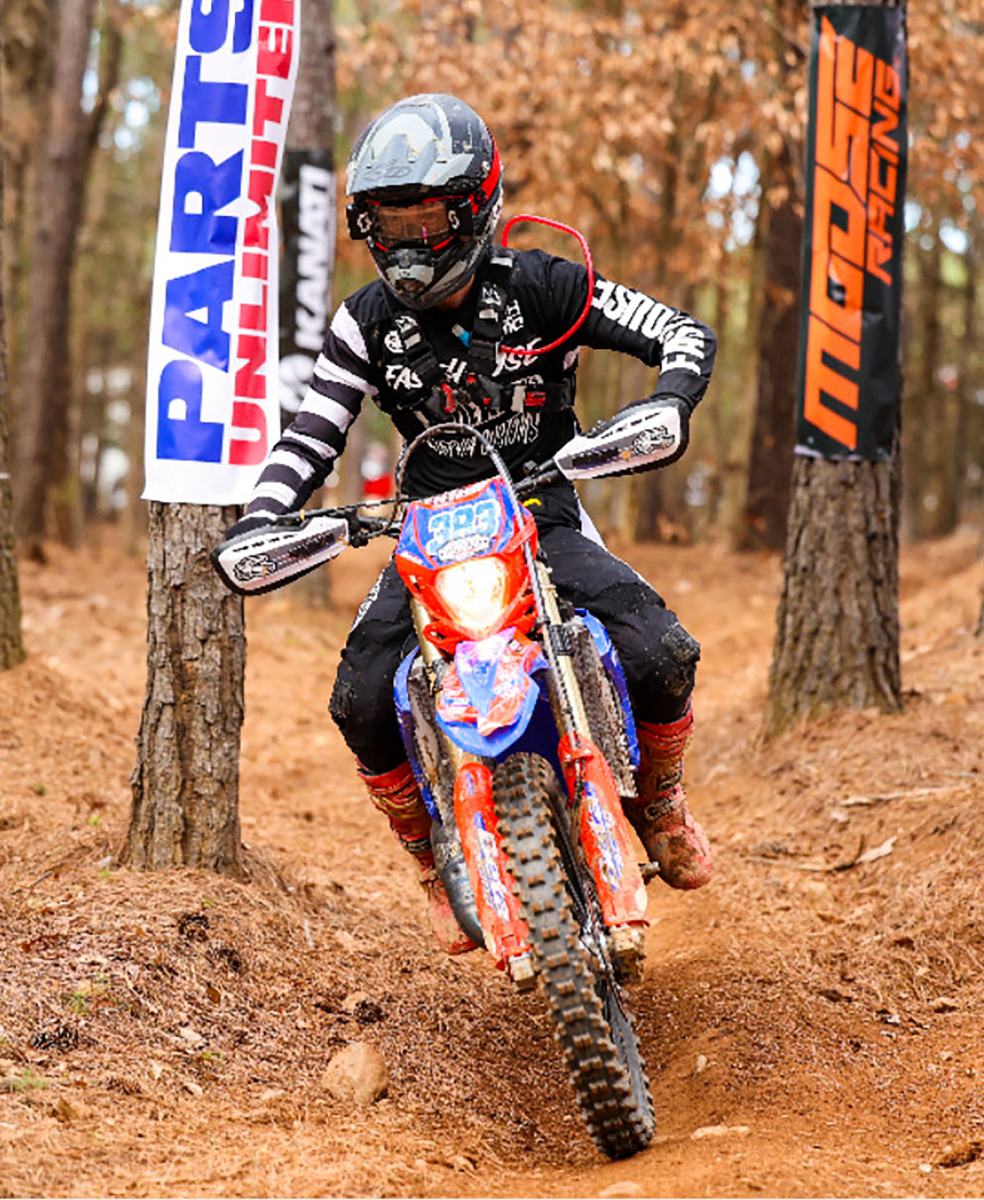 Second-year homeland security student James Churn practices motocross racing.