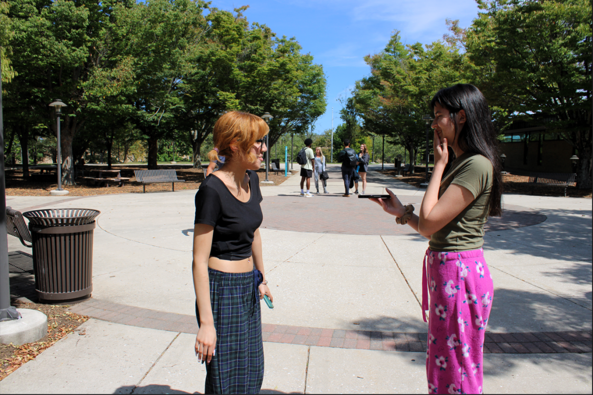 Second-year communications student Waleska Cruz (right) says she was shy before joining Campus Current.