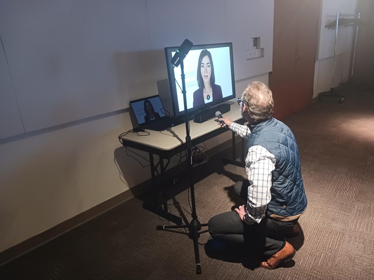 Mark Thomas, Dell Technology’s senior data scientist and artificial intelligence solutions architect, demonstrates a new AI software in front of a crowd. 