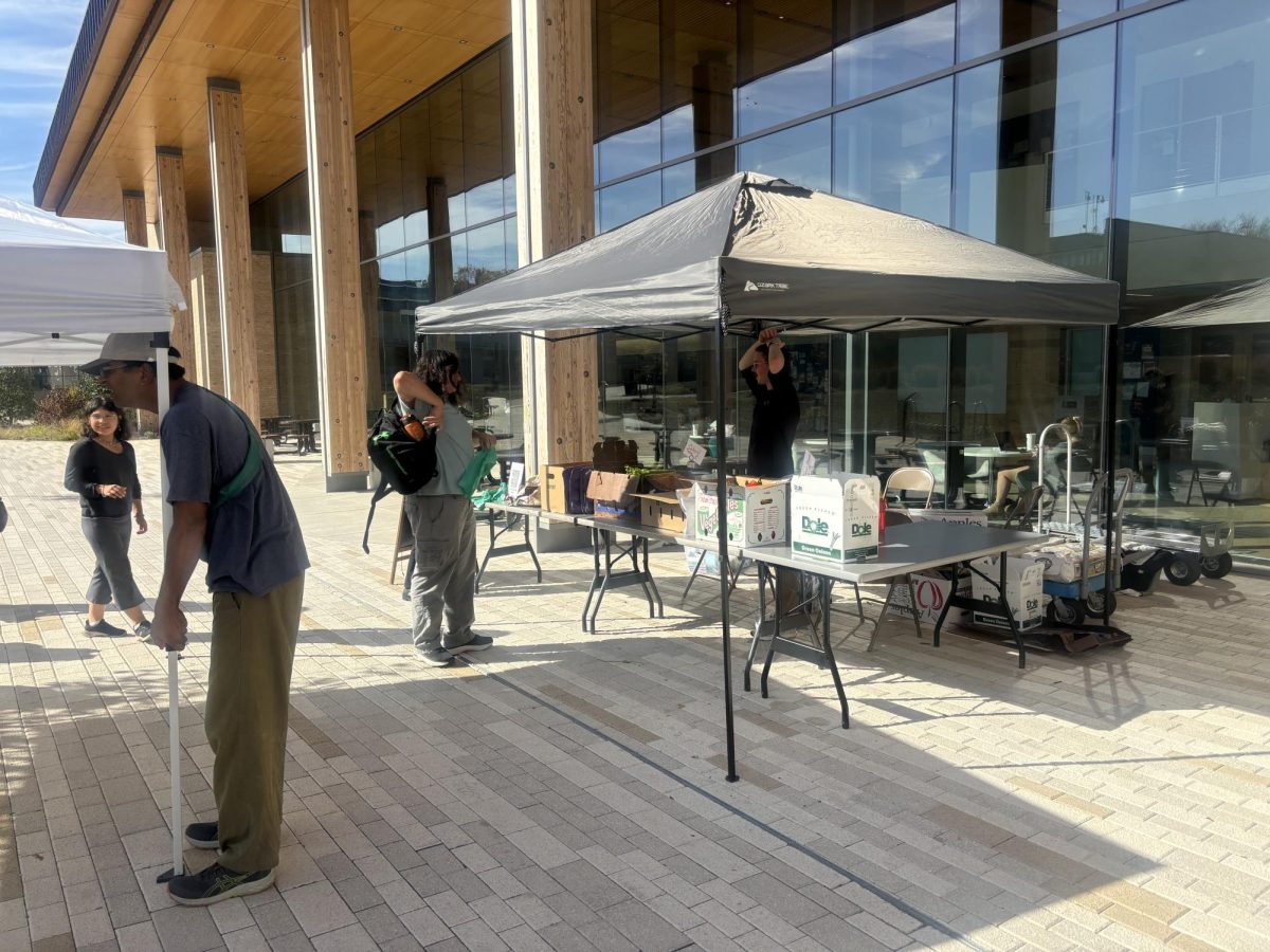 Students get free produce and strengthening equipment at a Wellness Wednesday event on Wednesday. 