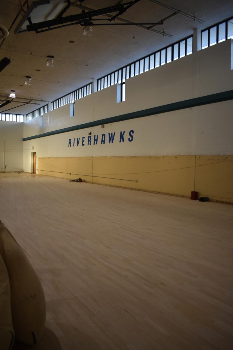 The college is replacing the bleachers on the basketball court at Jenkins Gymnasium.