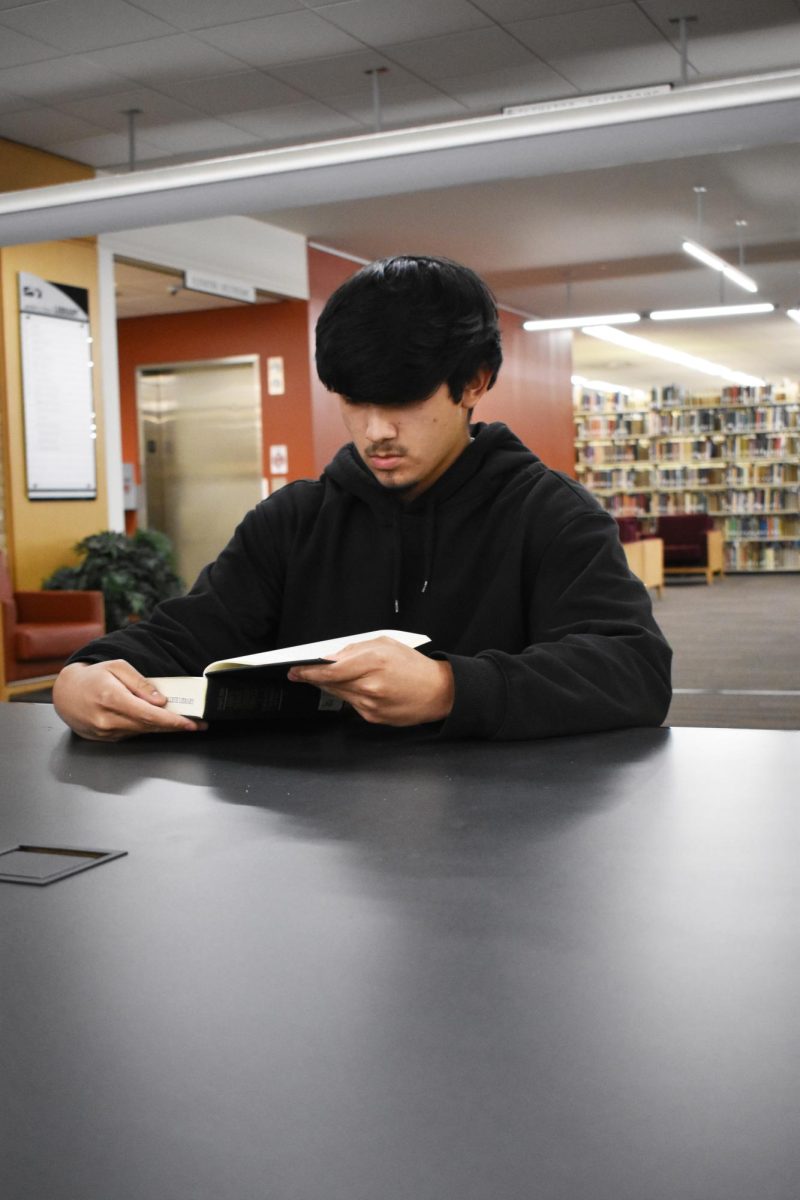 As the semester comes to a close, students should feel a sense of accomplishment. Shown, second-year biology student Gabe Aquino. 