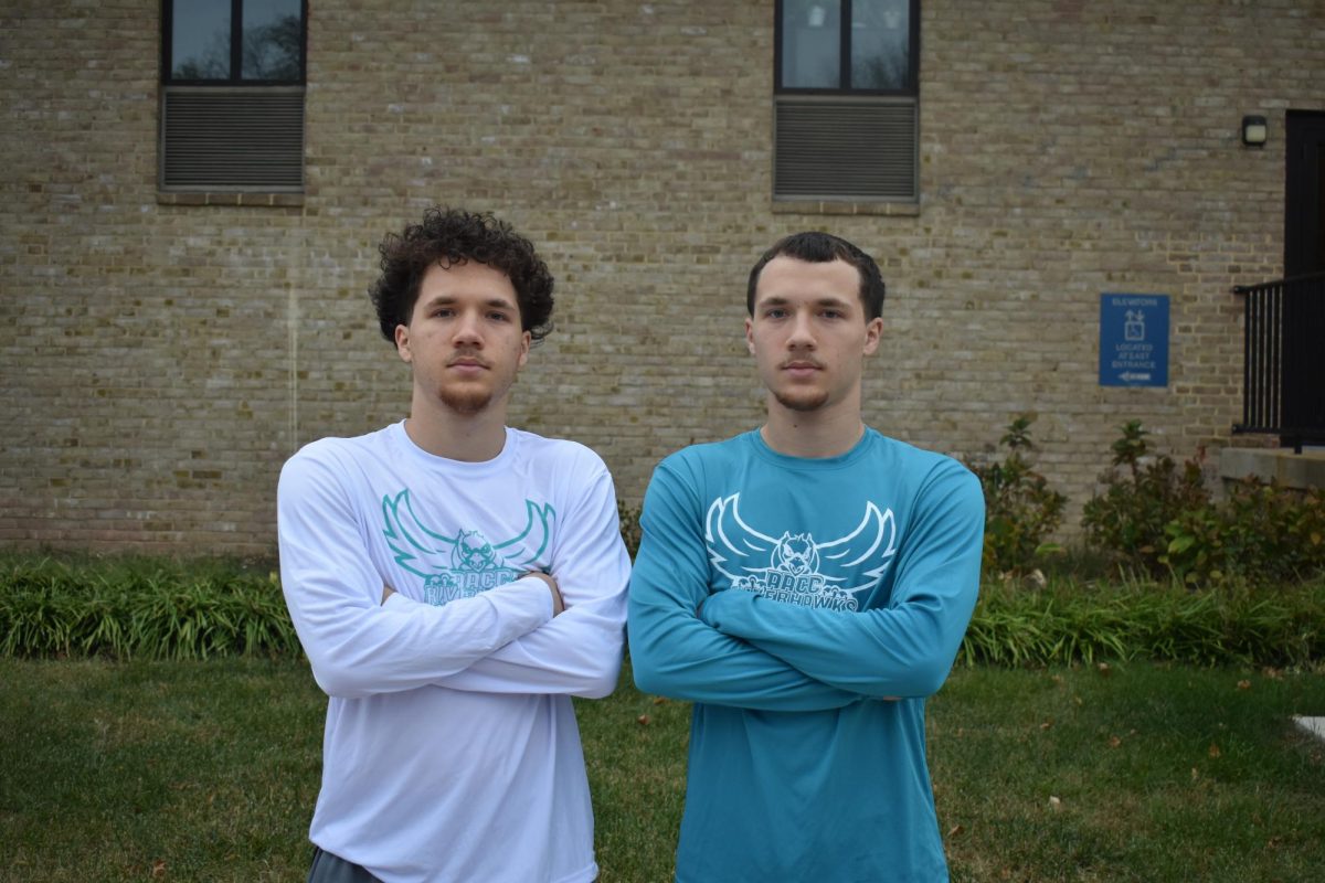 Twins Miles (right) and Avery Evans are team captains for the Riverhawks men’s basketball team. 